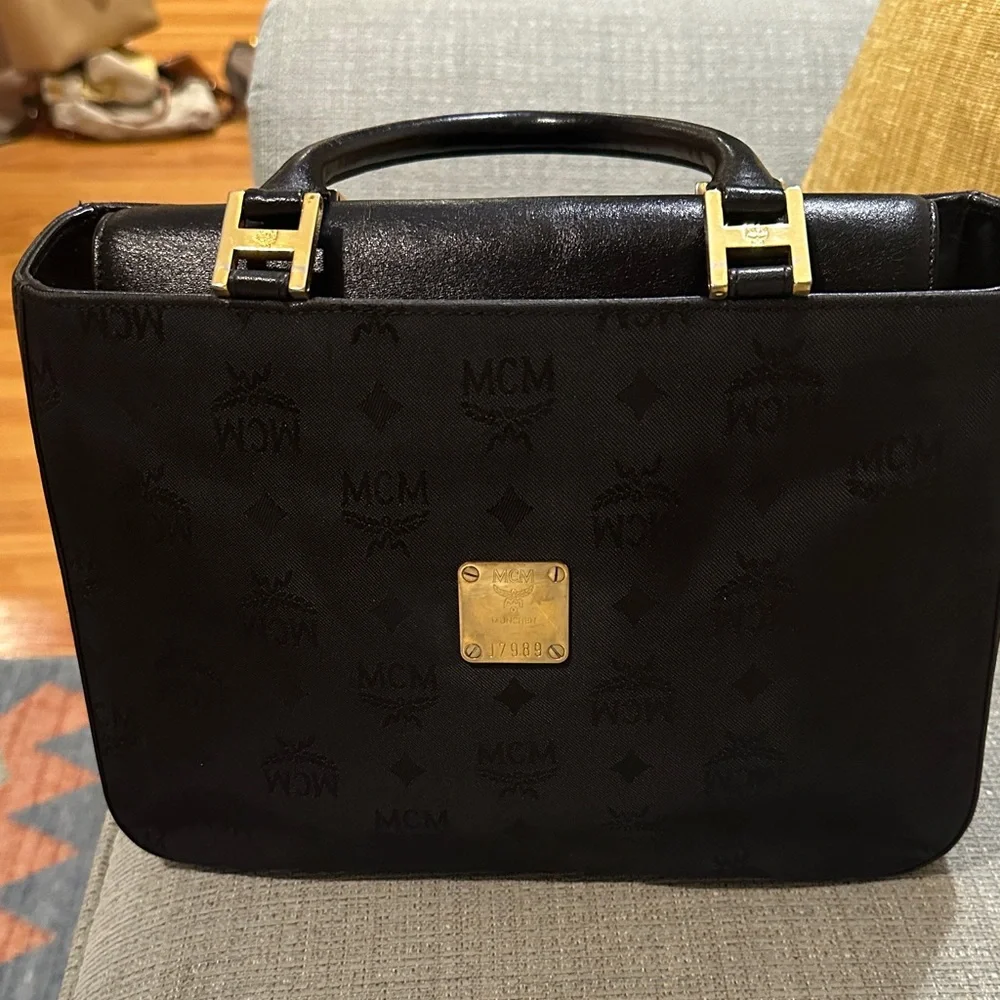 MCM Black Leather hand bag with Gold Accents. Made in Germany
